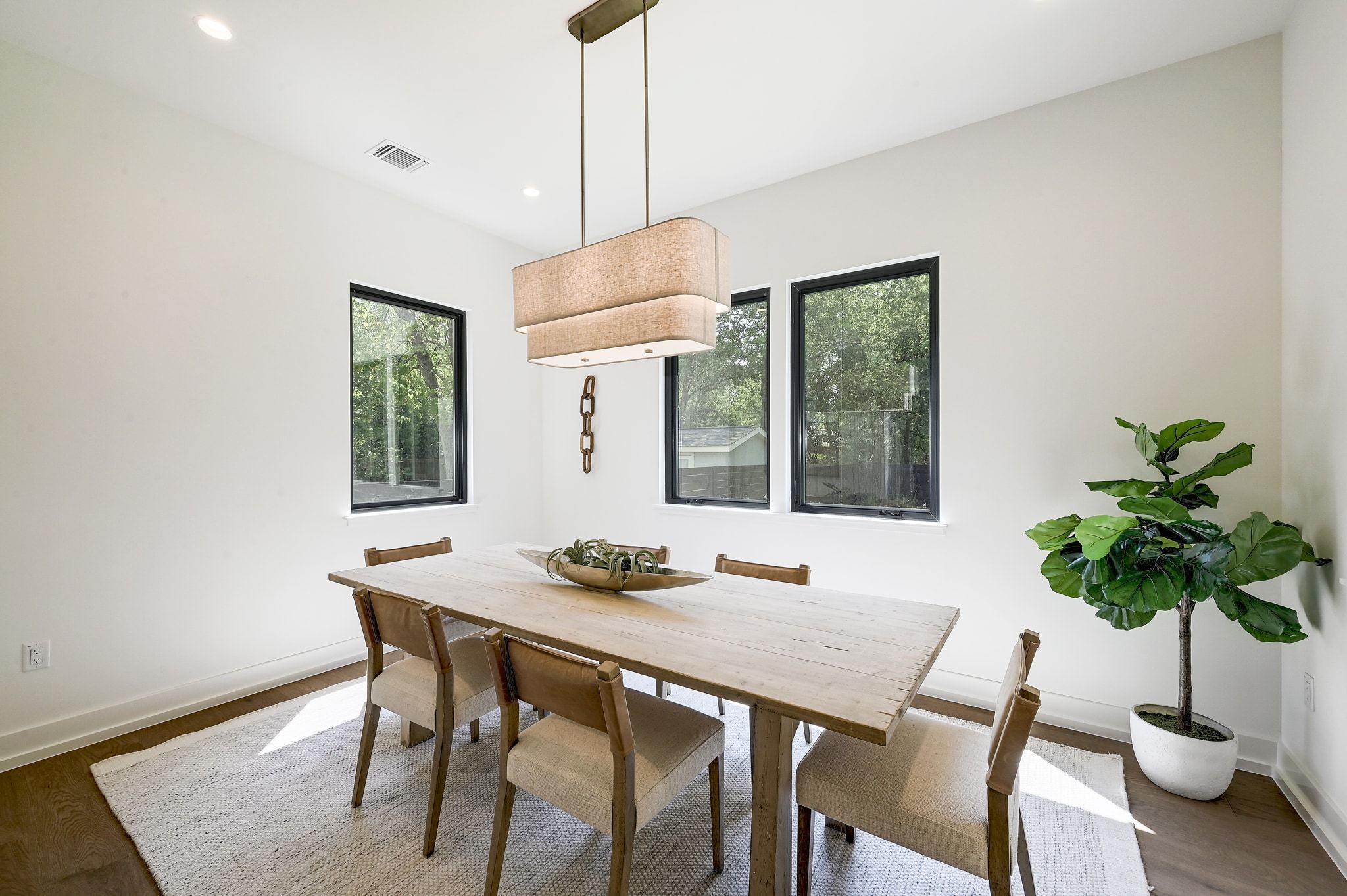 1705 Cullen Avenue Austin, TX 78757 - Photo 9 of 35 a view of a dining room with furniture window and wooden floor