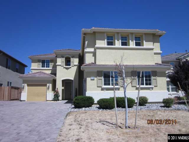 11109 Messina Way Reno, NV 89521 - Photo 1 of 11 a front view of a house with parking space