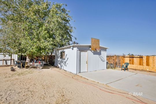 4512 Stark Street Ridgecrest, CA 93555 - Photo 20 of 22 a view of a backyard of the house