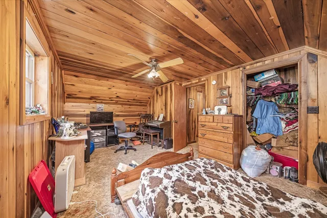 a view of a room with racks on the wall