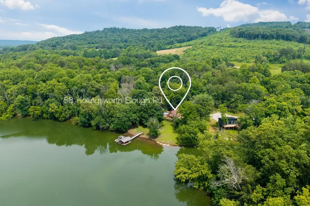 a view of a garden with a lake view