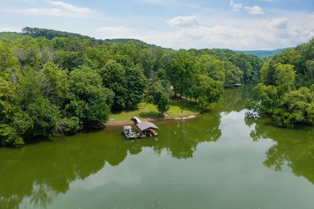 a view of lake with green space