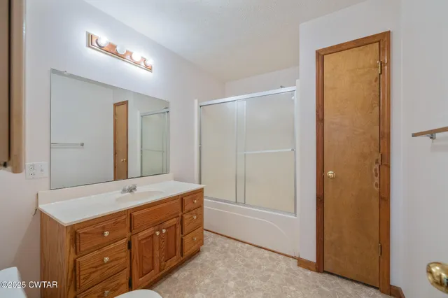 a view of a hallway with workspace