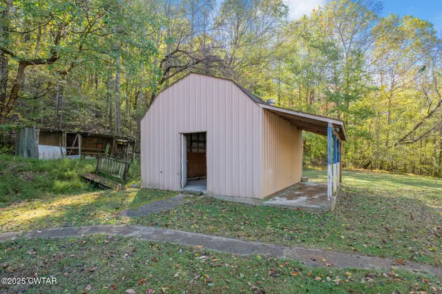 a view of an empty room with a glass door