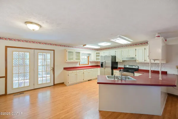 a view of a living room and dining room