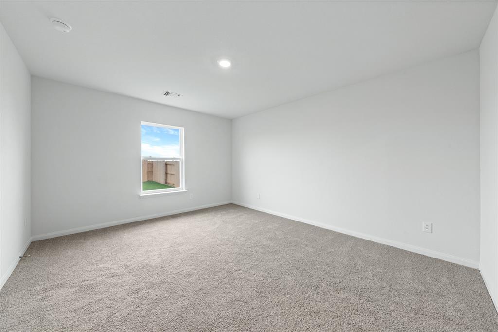 10121 Throttle Lane Fort Worth, TX 76131 - Photo 6 of 9 an empty room with windows