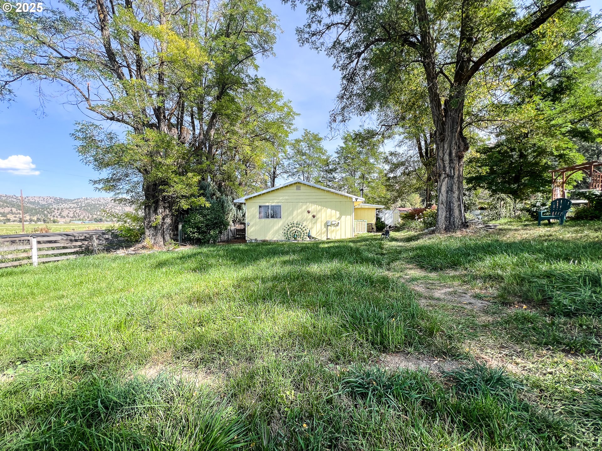 59920 Highway 26 John Day, OR 97845 - Photo 23 of 35 a view of a house with a yard