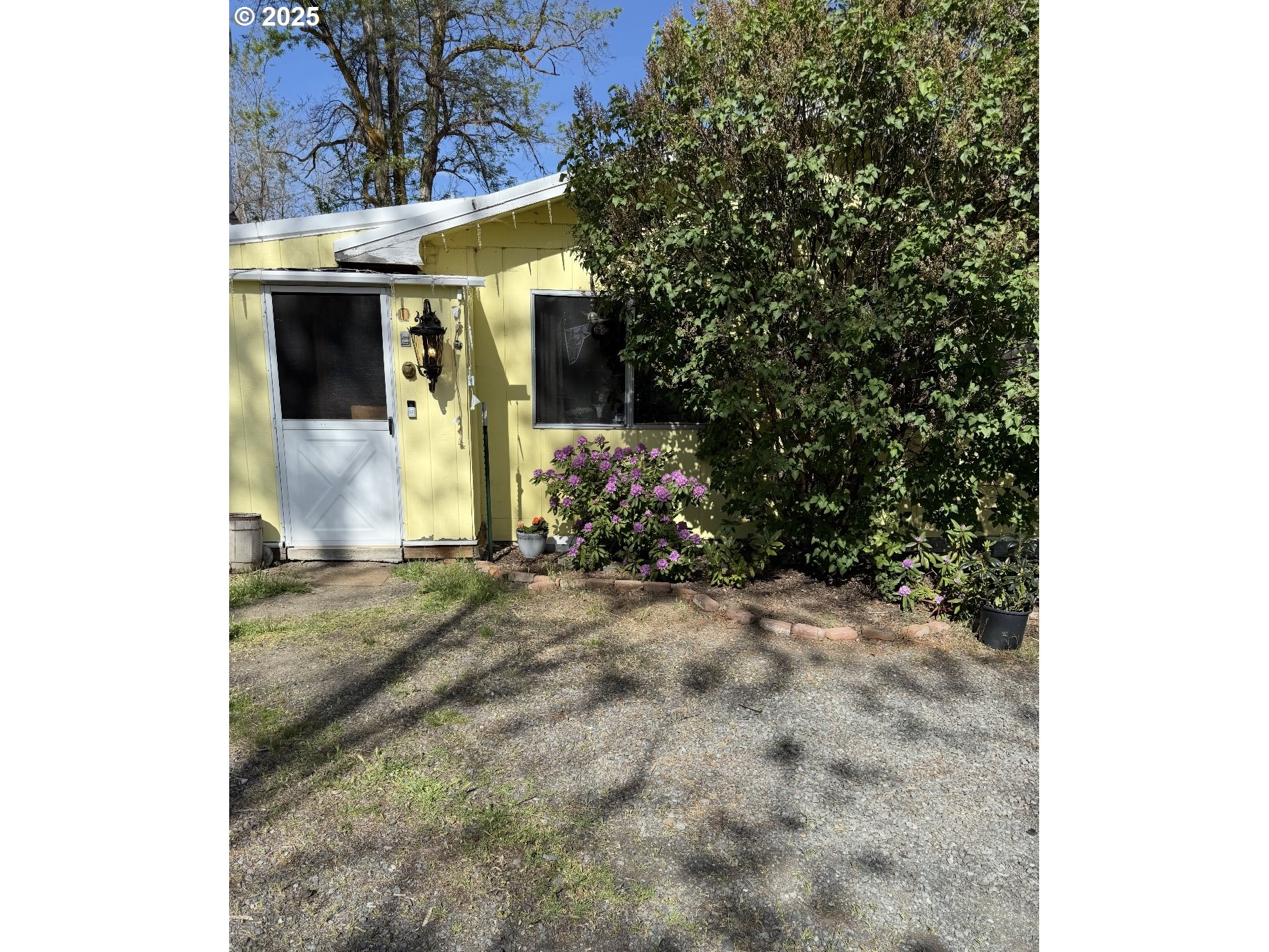 59920 Highway 26 John Day, OR 97845 - Photo 30 of 35 a view of a house with large trees
