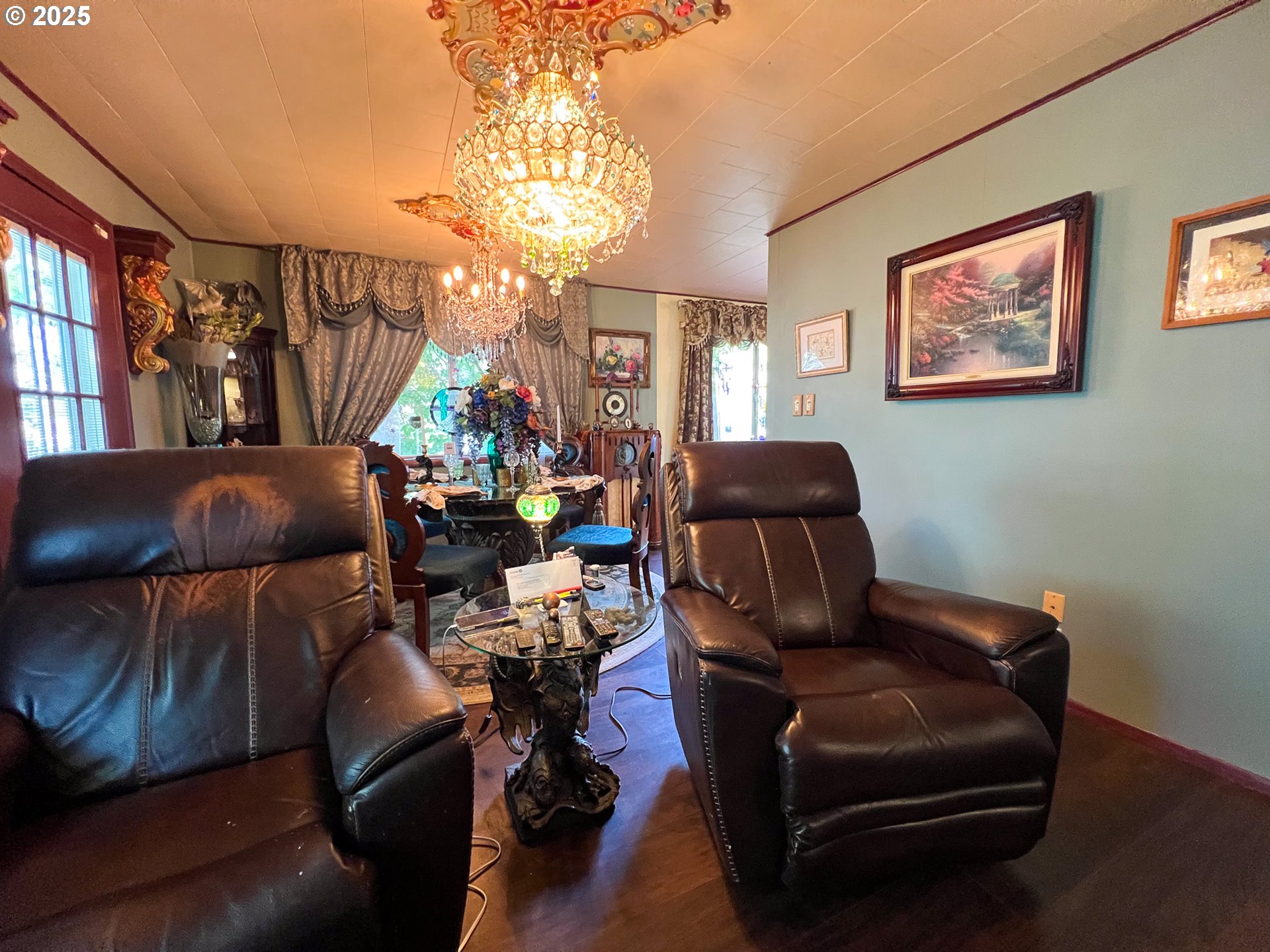 59920 Highway 26 John Day, OR 97845 - Photo 6 of 35 a living room with furniture and a chandelier