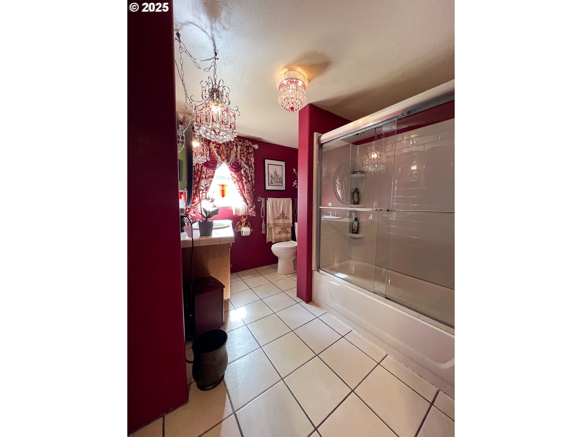 59920 Highway 26 John Day, OR 97845 - Photo 10 of 35 a bathroom with a glass shower door and a bathtub