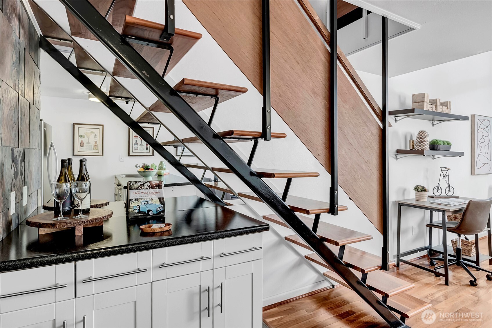 1000 Union Street, Unit 202 Seattle, WA 98101 - Photo 12 of 30 a view of entryway and hall with wooden floor and furniture