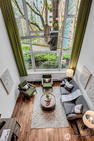 a table with white wooden table and chairs