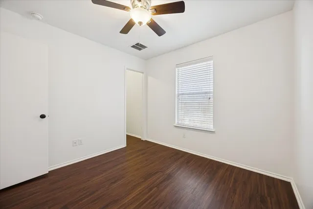 a bathroom with a sink toilet a mirror and shower