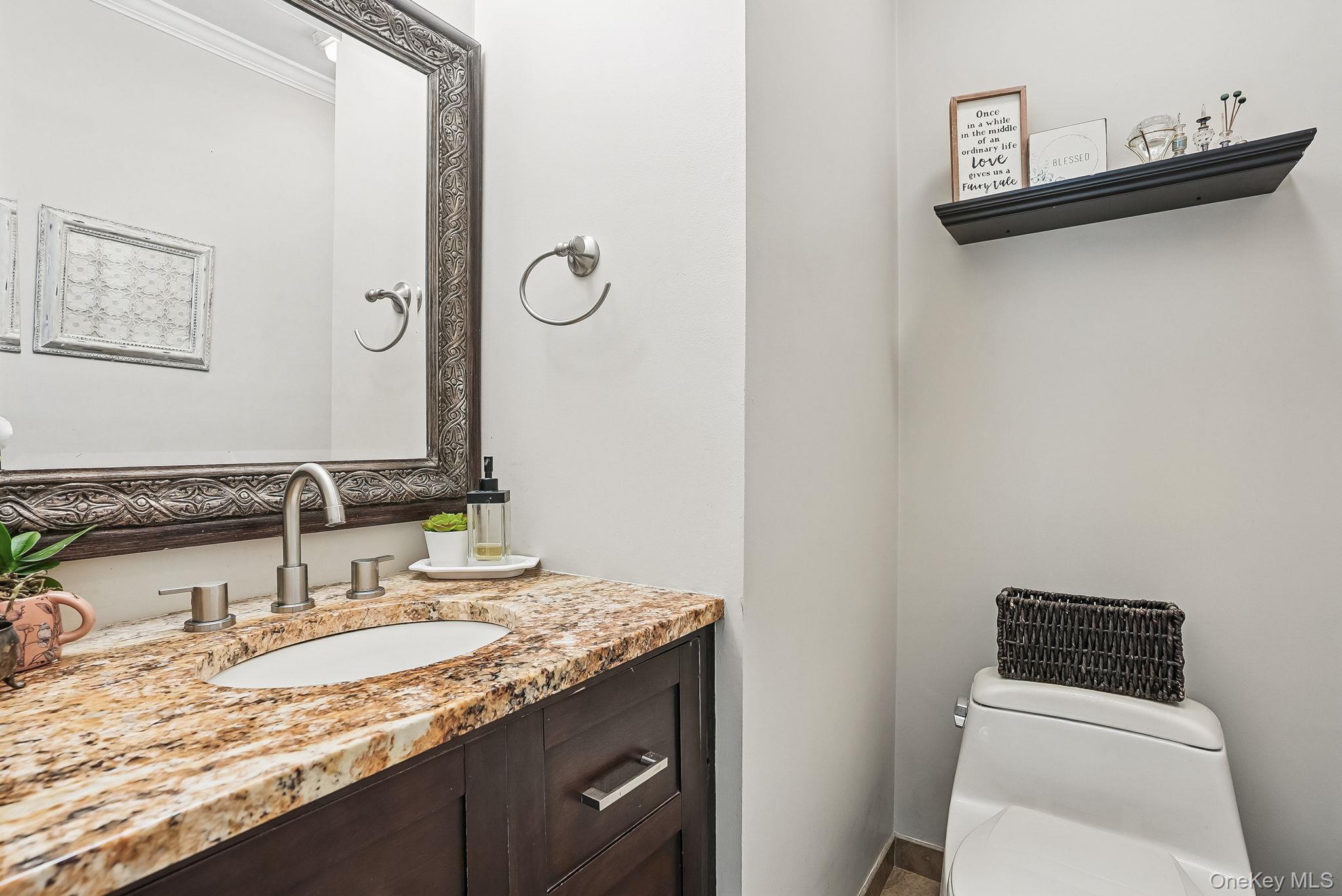 304 Church Road Putnam Valley, NY 10579 - Photo 29 of 50 Half bath with toilet, vanity, and crown molding