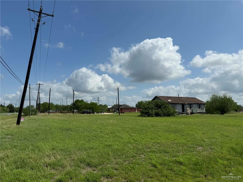 12427 Sasha Drive Santa Rosa, TX 78593 - Photo 16 of 17 a view of a fountain in front of a house