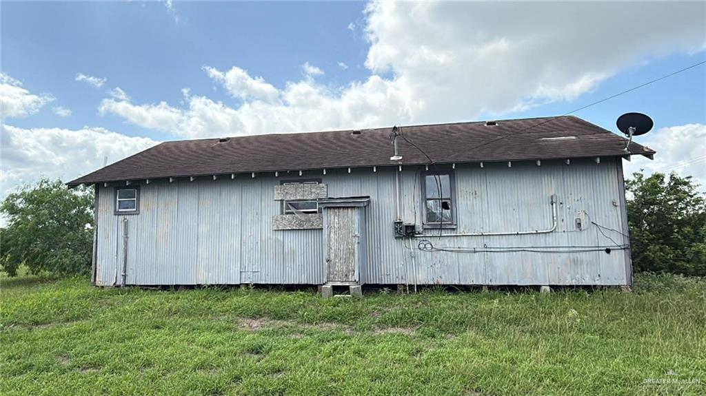 12427 Sasha Drive Santa Rosa, TX 78593 - Photo 5 of 17 a view of a back yard of the house