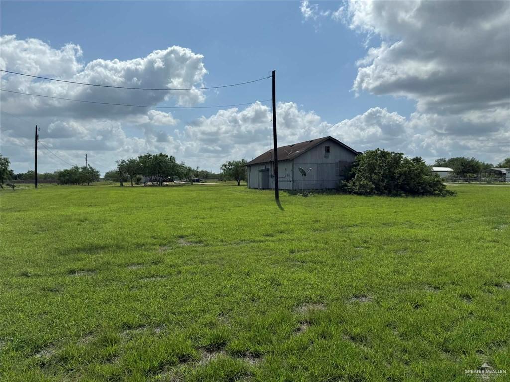 12427 Sasha Drive Santa Rosa, TX 78593 - Photo 6 of 17 a view of a tree in front of a house