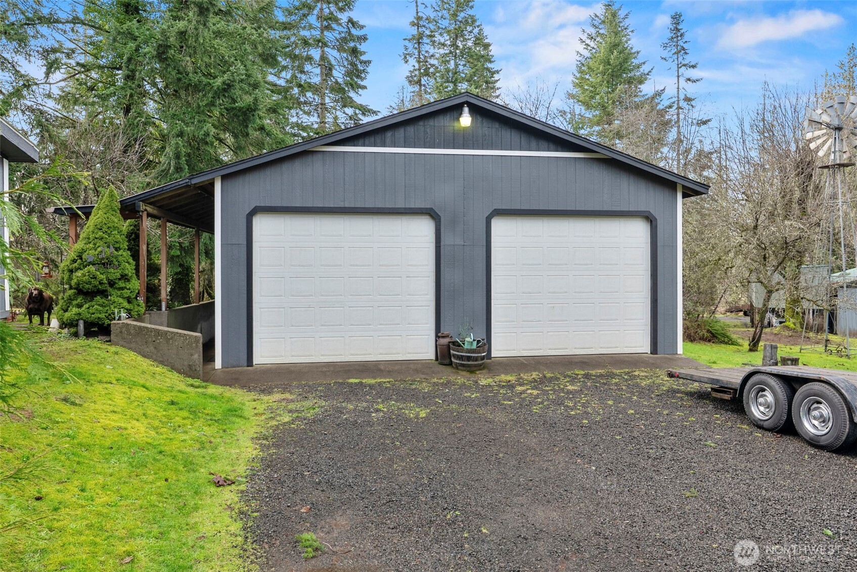 1337 South Silver Lake Road Castle Rock, WA 98611 - Photo 17 of 35 a front view of a house with a yard