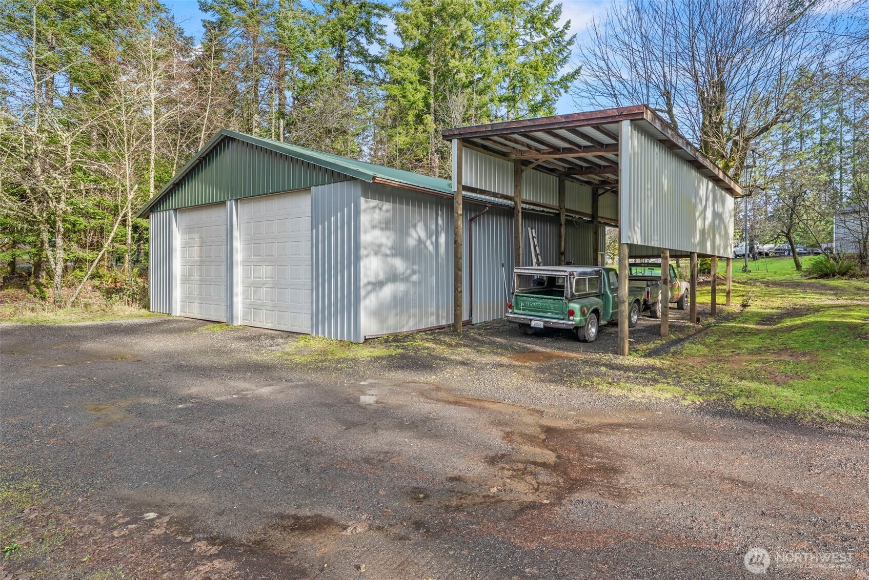 1337 South Silver Lake Road Castle Rock, WA 98611 - Photo 19 of 35 a view of a house with backyard and trees