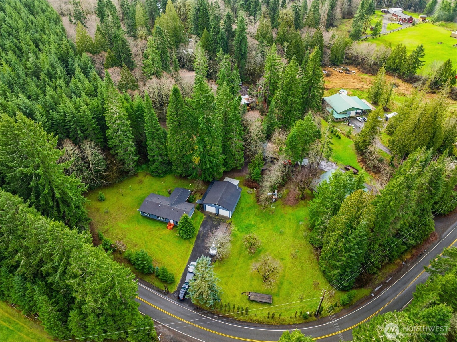 1337 South Silver Lake Road Castle Rock, WA 98611 - Photo 32 of 35 a view of a swimming pool with a yard