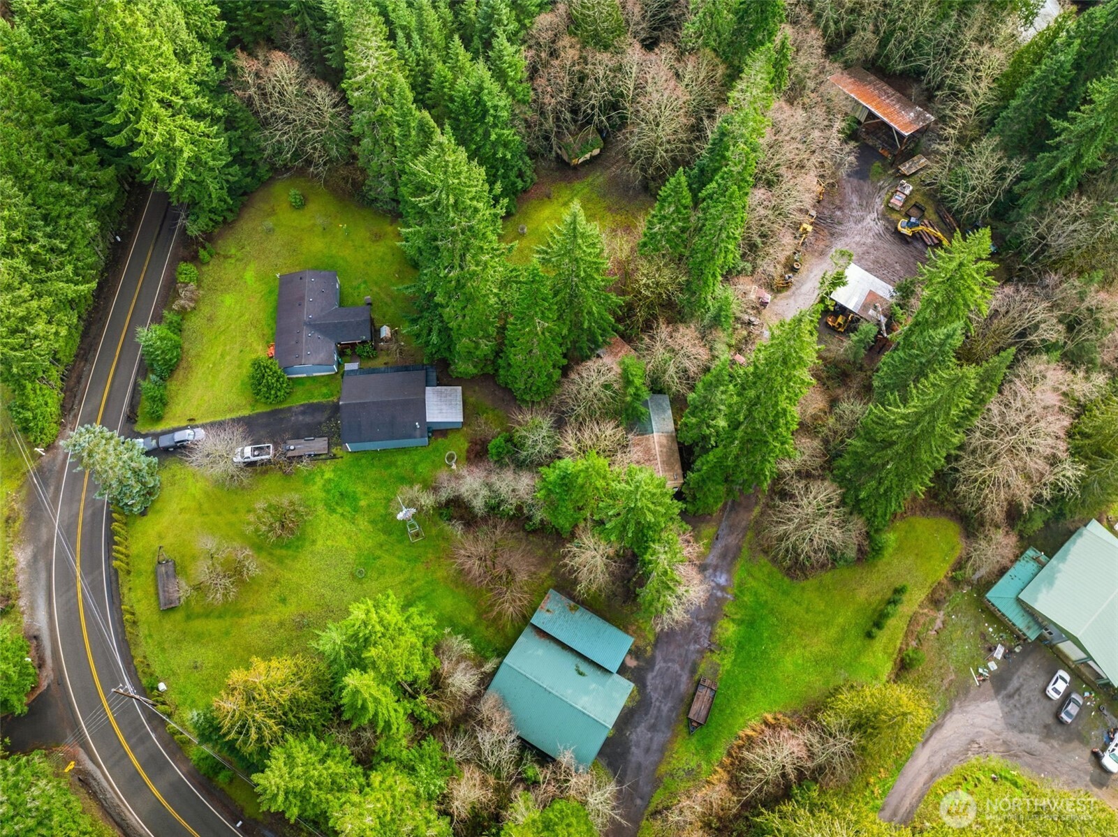 1337 South Silver Lake Road Castle Rock, WA 98611 - Photo 34 of 35 an aerial view of a house with garden space trees and houses