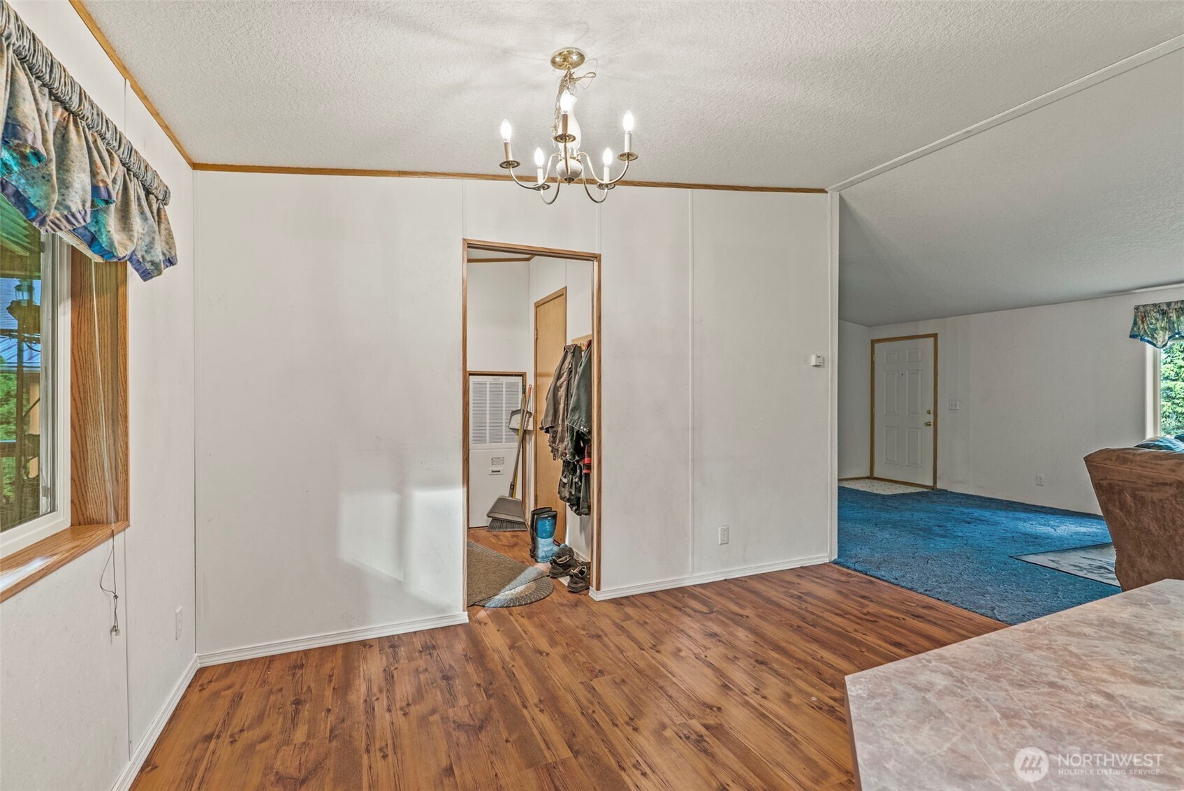 1337 South Silver Lake Road Castle Rock, WA 98611 - Photo 9 of 35 a bedroom with a bed and wooden floor