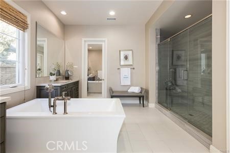 112 Gardenview Irvine, CA 92618 - Photo 15 of 33 a room with a chandelier furniture and a large window