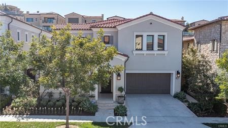 112 Gardenview Irvine, CA 92618 - Photo 2 of 33 a front view of a house with garden