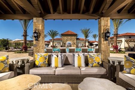 112 Gardenview Irvine, CA 92618 - Photo 31 of 33 a living room with furniture and a fireplace