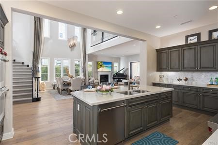 112 Gardenview Irvine, CA 92618 - Photo 7 of 33 a kitchen with a sink stove and cabinets