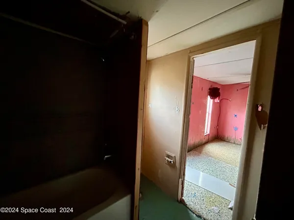 a bathroom with a sink and toilet