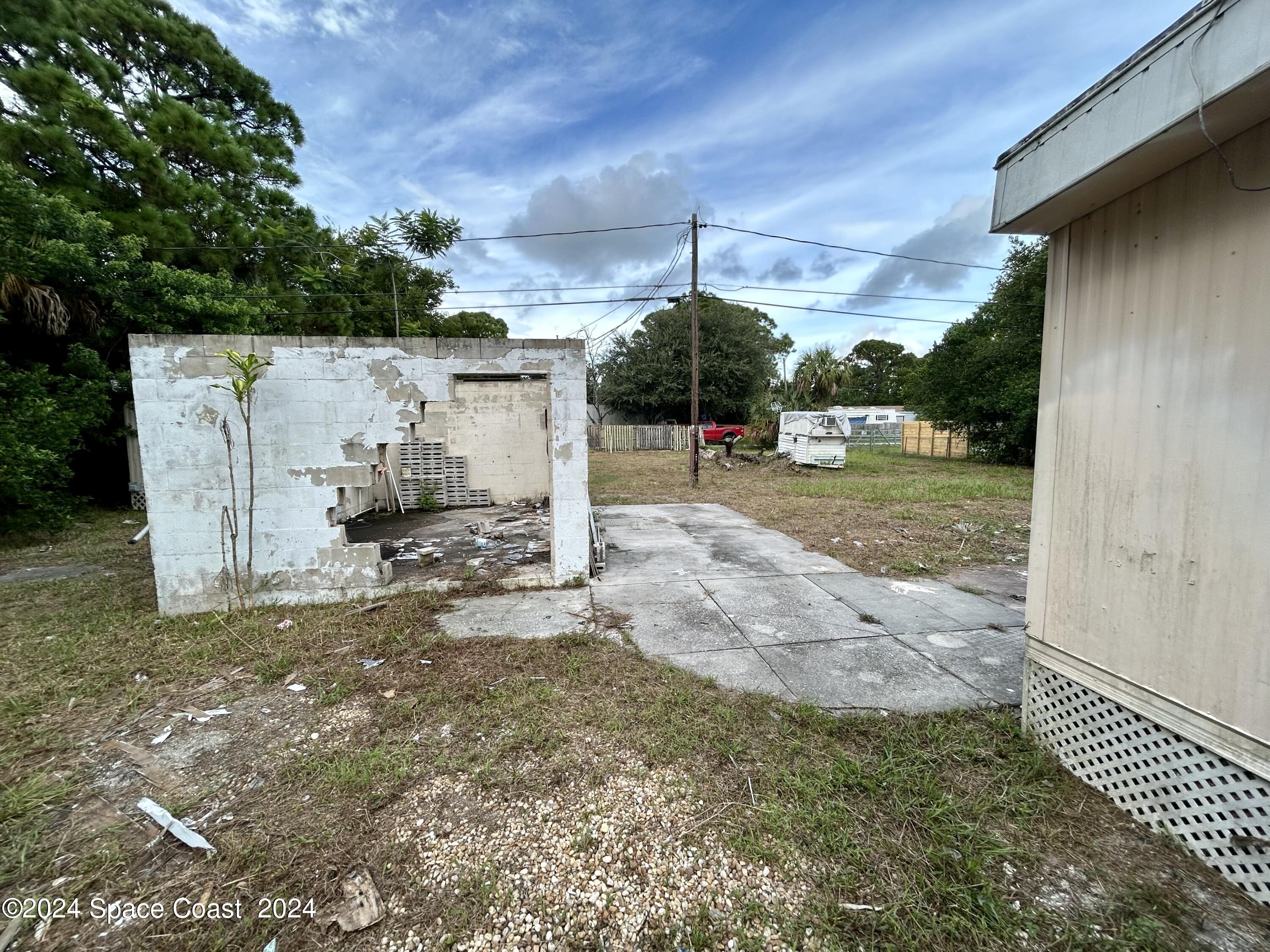 326 Iris Street Cocoa, FL 32927 - Photo 31 of 46 a view of a backyard