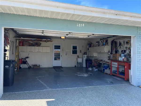 a workspace with furniture and window