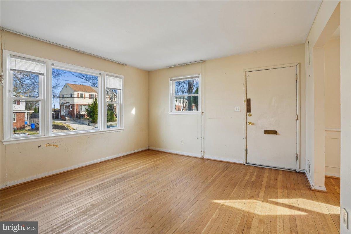 12015 Claridge Road Silver Spring, MD 20902 - Photo 11 of 33 Sun lit living room