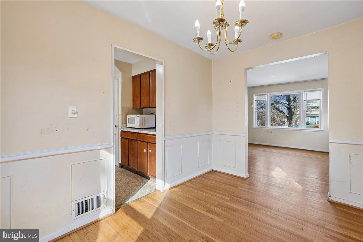 12015 Claridge Road Silver Spring, MD 20902 - Photo 13 of 33 Dining room off kitchen and living room