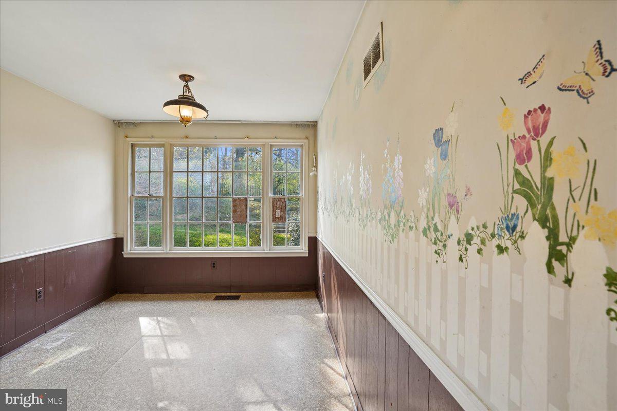 12015 Claridge Road Silver Spring, MD 20902 - Photo 18 of 33 Family room with exit to backyard