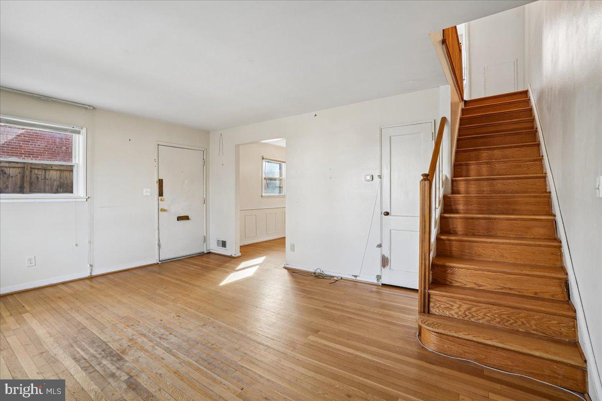 12015 Claridge Road Silver Spring, MD 20902 - Photo 10 of 33 Living room heading upstairs