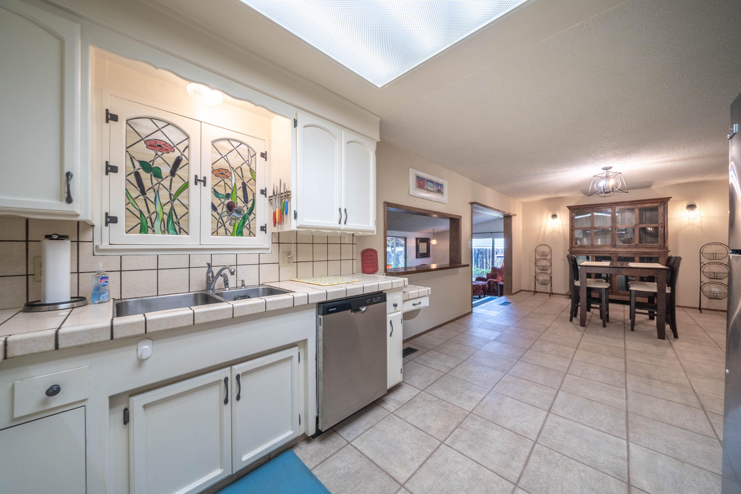 569 Rafael Street Redding, CA 96002 - Photo 10 of 49 Kitchen opens to dining room