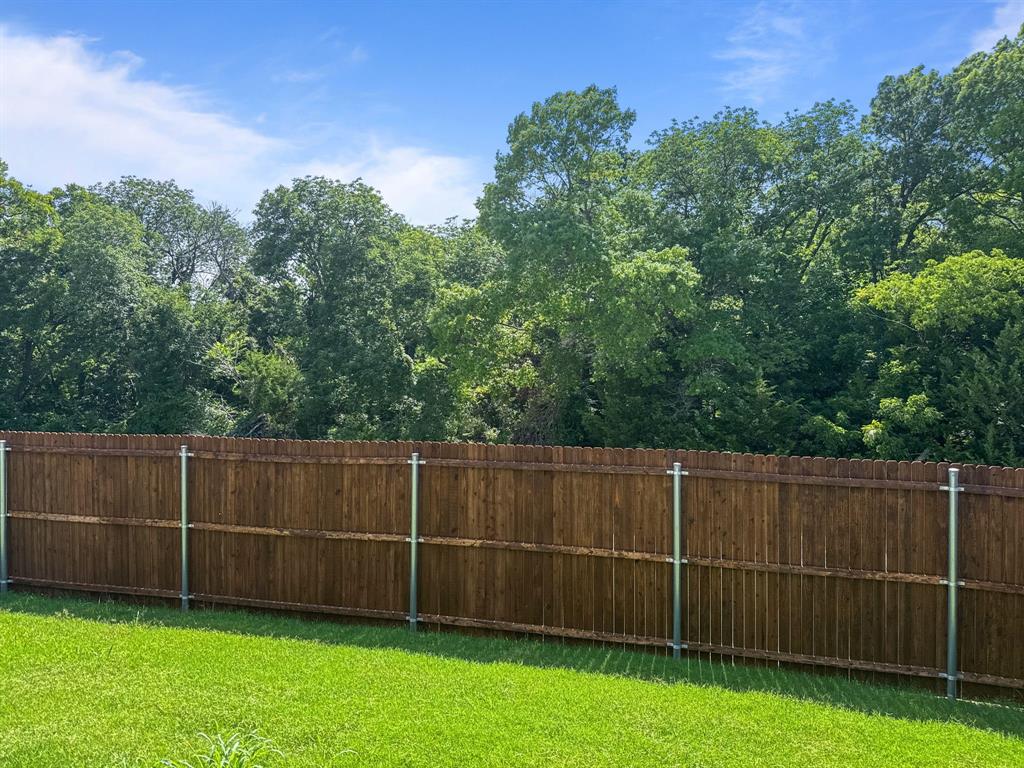 1908 Iris Road Melissa, TX 75454 - Photo 30 of 30 a view of a yard with a fence