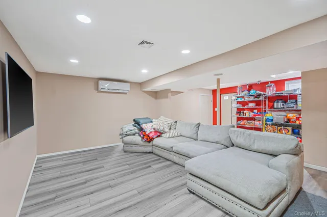 a bathroom with a sink vanity and toilet