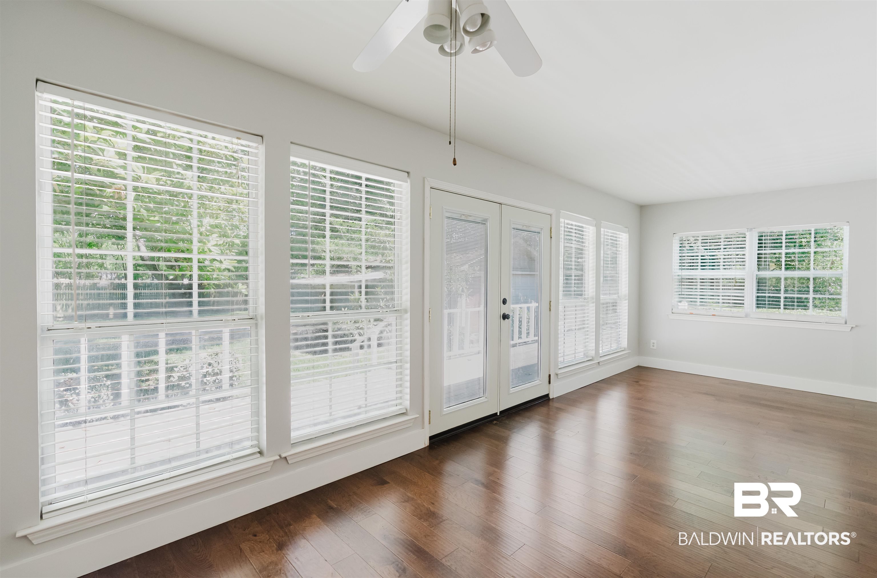 20460 Bishop Road Fairhope, AL 36532 - Photo 28 of 41 Unfurnished sunroom with french doors