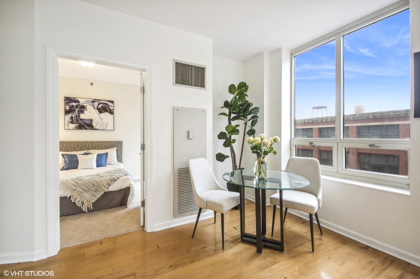 1111 South Wabash Avenue, Unit 706 Chicago, IL 60605 - Photo 11 of 19 a view of a livingroom with furniture and windows