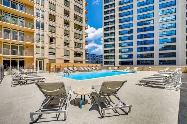 1111 South Wabash Avenue, Unit 706 Chicago, IL 60605 - Photo 18 of 19 a view of a swimming pool with lounge chairs
