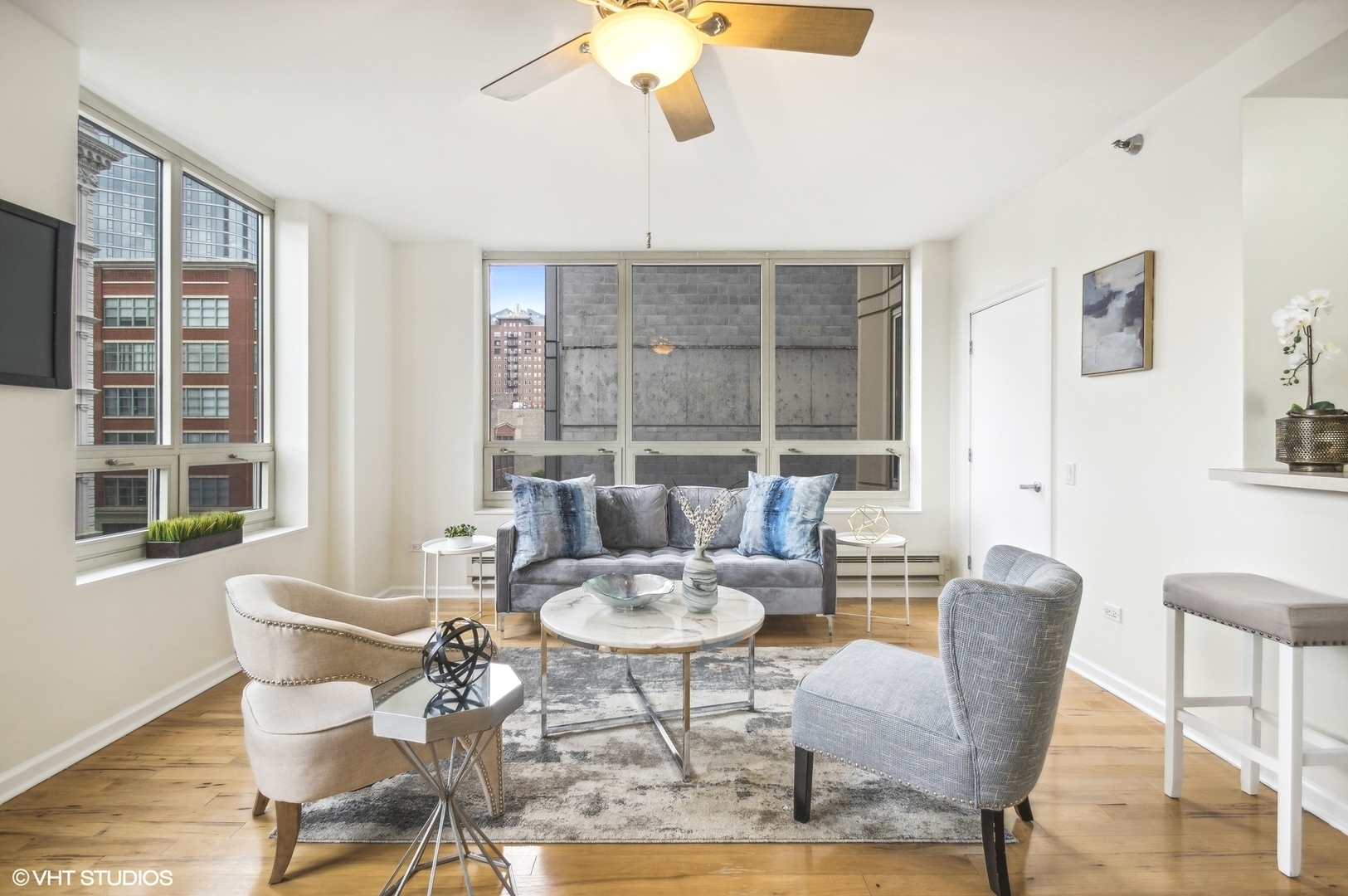 1111 South Wabash Avenue, Unit 706 Chicago, IL 60605 - Photo 5 of 19 a view of a dining room with furniture window and outside view