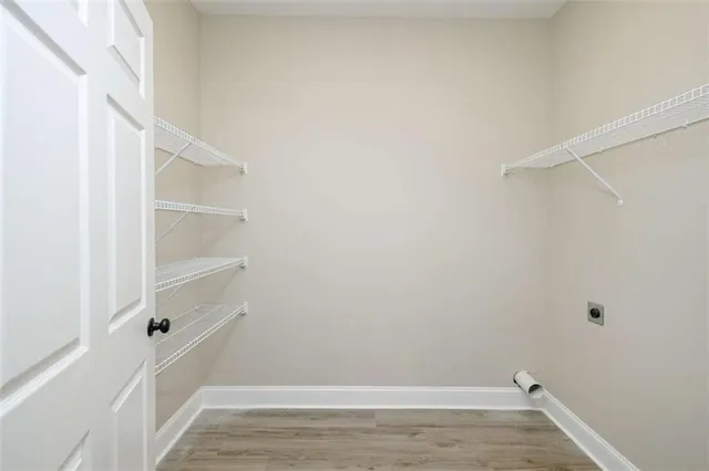 a view of an empty walk in closet