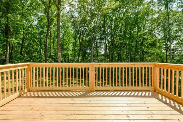 a view of a wooden roof deck