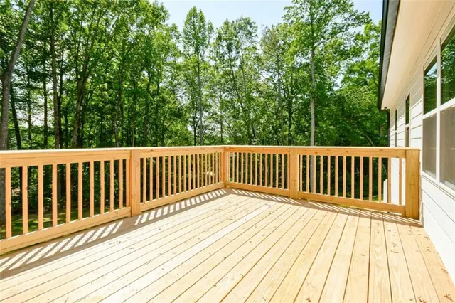 a balcony with wooden floor