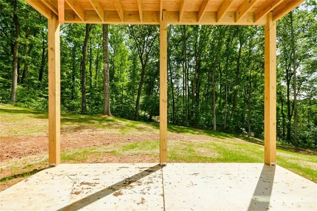 a view of a backyard of the house