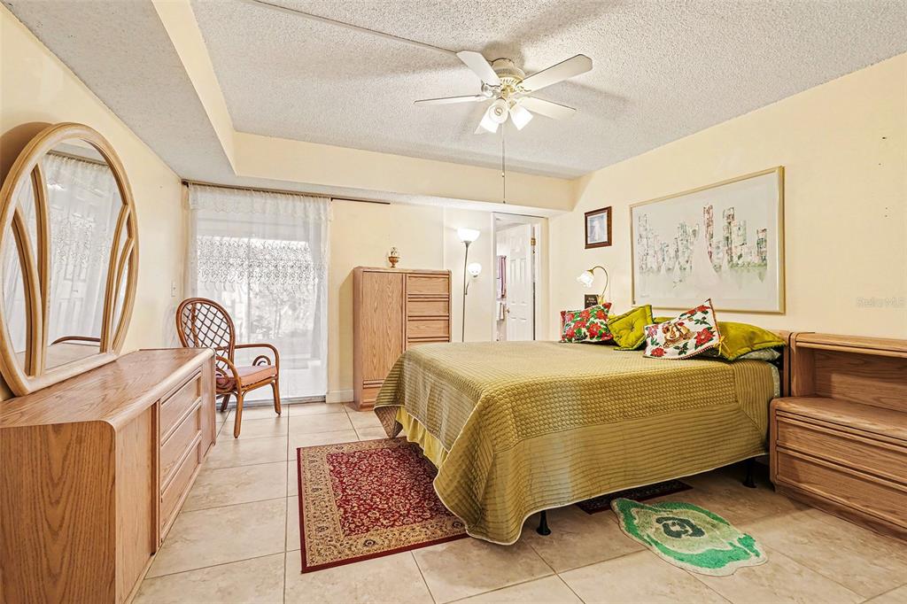 4742 Azalea Drive, Unit 103 New Port Richey, FL 34652 - Photo 17 of 33 a living room with furniture and a window
