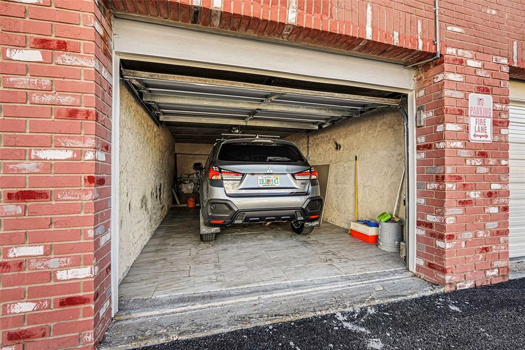 4742 Azalea Drive, Unit 103 New Port Richey, FL 34652 - Photo 24 of 33 a utility room with dryer and washer